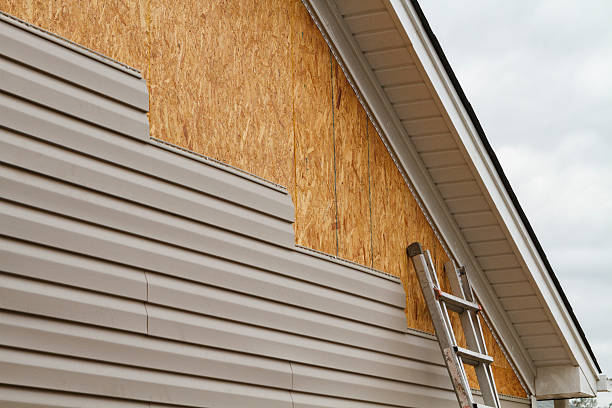 Professional Siding Contractor technician working in Winfield, WV